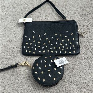 - NWT , Fossil , wallet wristlet WITH coin purse. 
Leather